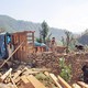 Sluggish reconstruction efforts add to woes of quake survivors